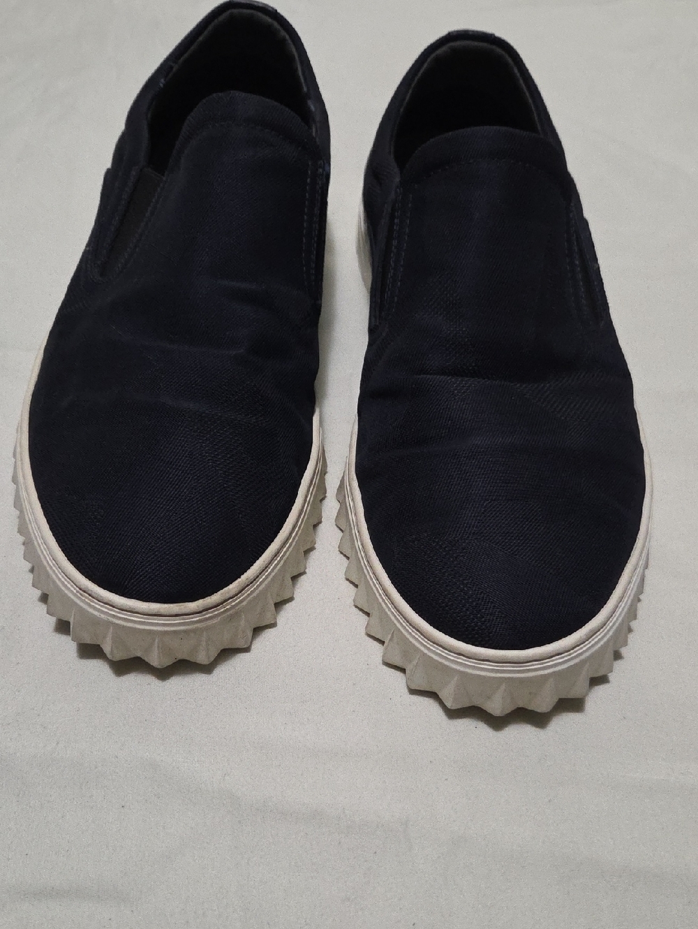 Salvatore Ferragamo Navy Slip-On Canvas Loafers with White Sole.